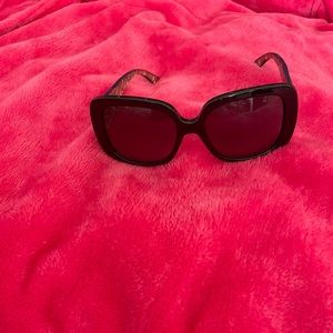 Black and purple Dior sun glasses